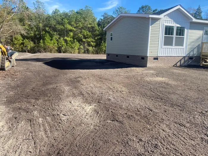 New home set on a cleared and leveled lot in Brunswick County