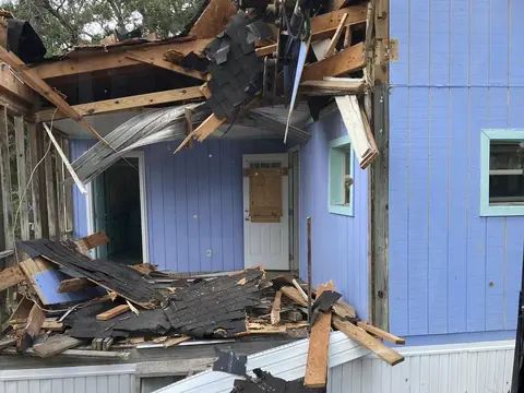 Wall panels pulled and dropped inside the footprint — Coastal Clearing & Debris, Brunswick County NC
