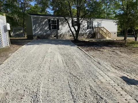 Full-length drive run in and rolled — Coastal Clearing & Debris, Brunswick County NC