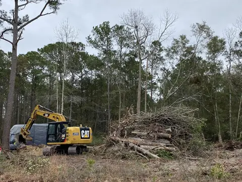 Debris pushed up into a pile for haul-off — Coastal Clearing & Debris, Brunswick County NC