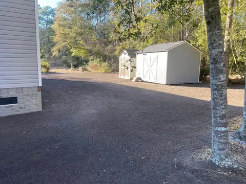 Drive and yard tied together in one pass — Coastal Clearing & Debris, Brunswick County NC