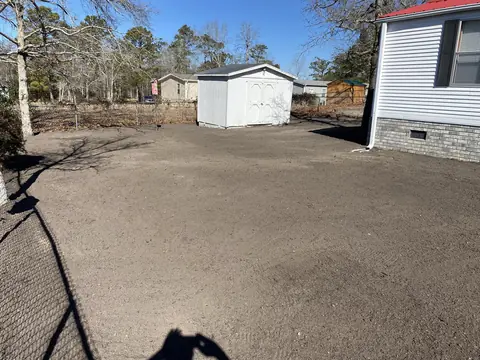 Grading between structures on a tight lot — Coastal Clearing & Debris, Brunswick County NC